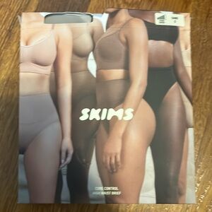 Core control high waist brief sand S. Never warn only have tried on